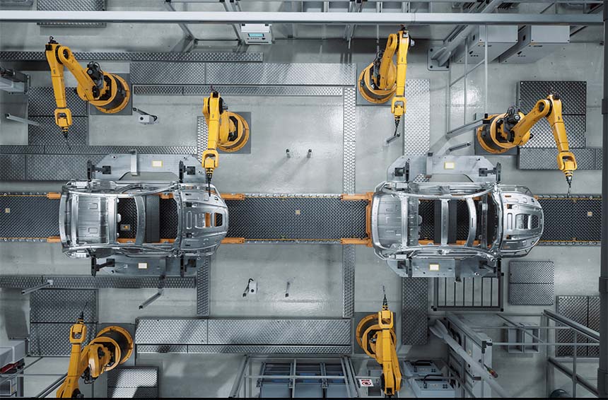 aerial view of an assembly line with robotic arms