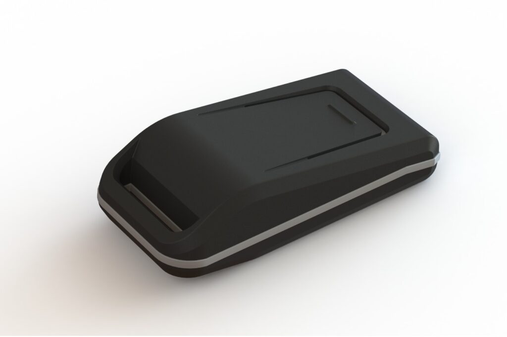 A small black device on a white surface.